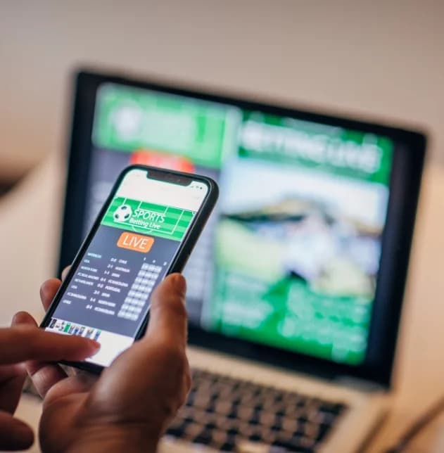 Developer working on a website and mobile app interface